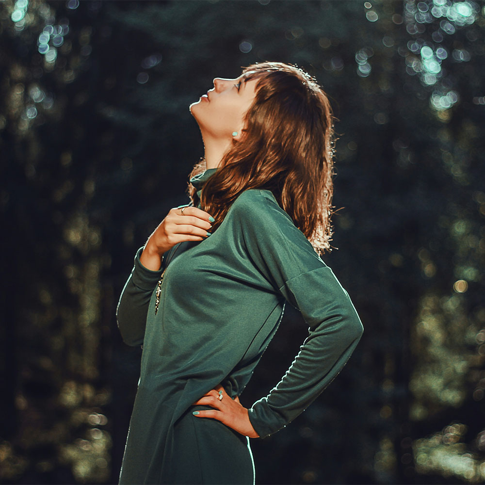 image of woman in green dress